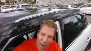 Getting into our mini-cooper rental car. Clank!