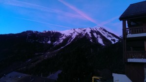 Contrails over the Swiss Alps