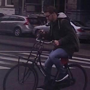 Cyclist checking email